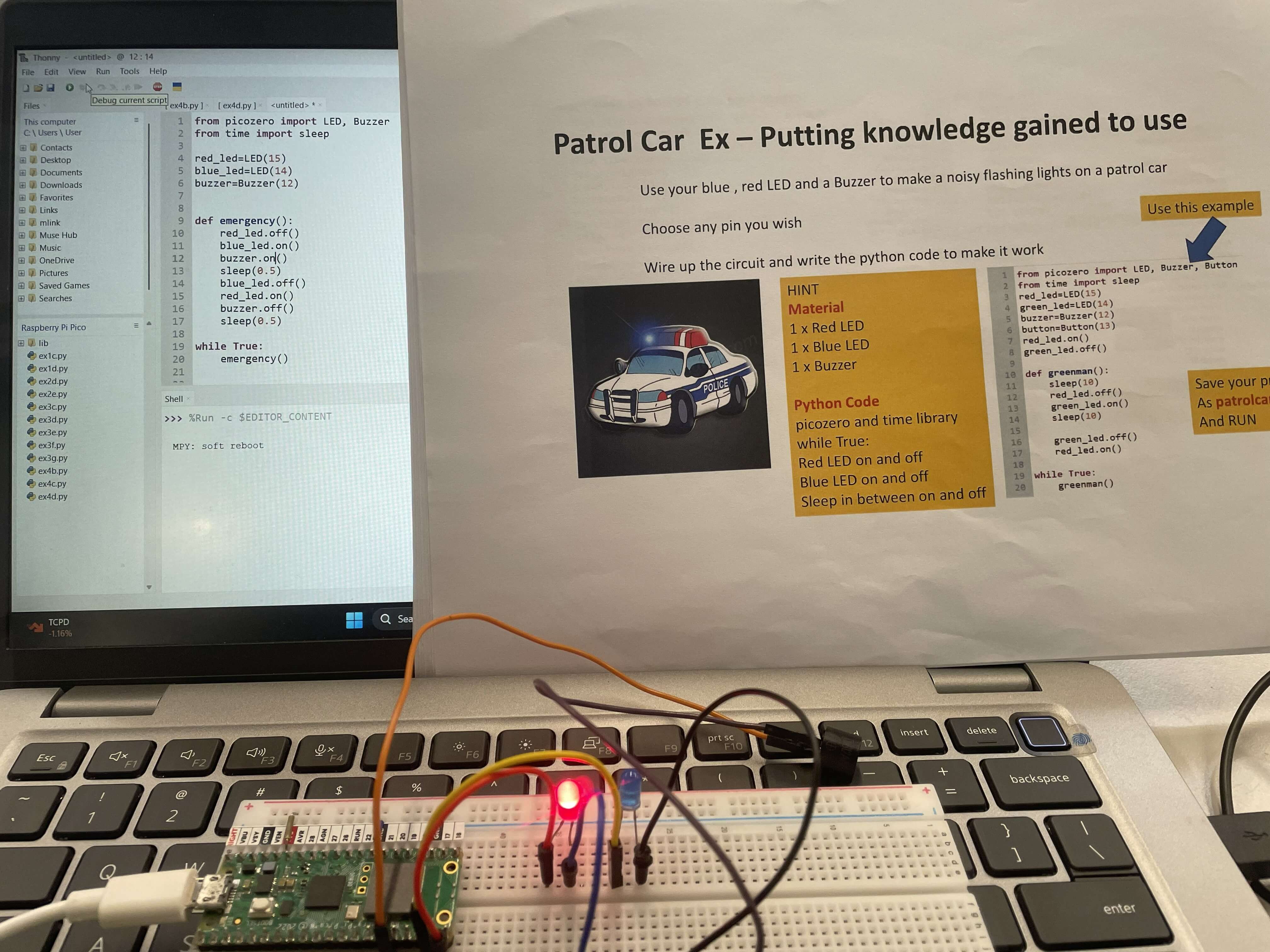 Raspberry Pi Pico breadboard project with red and blue LEDs wired up for a patrol car exercise